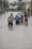 Personas caminan por una calle inundada por fuertes lluvias este viernes, en Bahía Blanca (Argentina). EFE/ Pablo Presti
