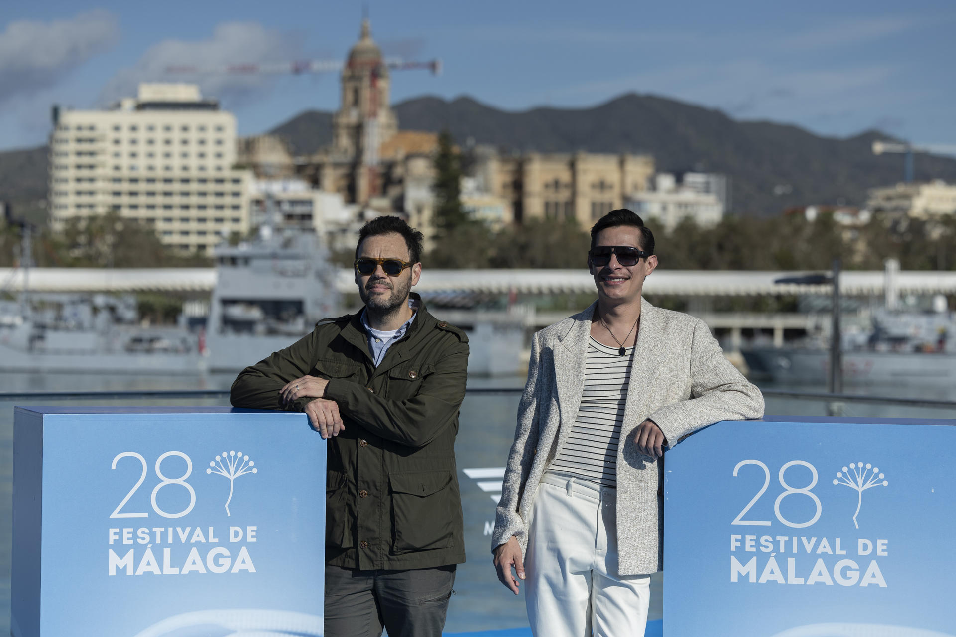 El director Carlos Armella (i) posa con el actor Luis Alberti tras presentar su película 'El diablo en el camino' a la sección oficial del Festival del Cine Español de Málaga, este viernes en el Muelle Uno del Puerto de la capital malagueña.  EFE/ Jorge Zapata