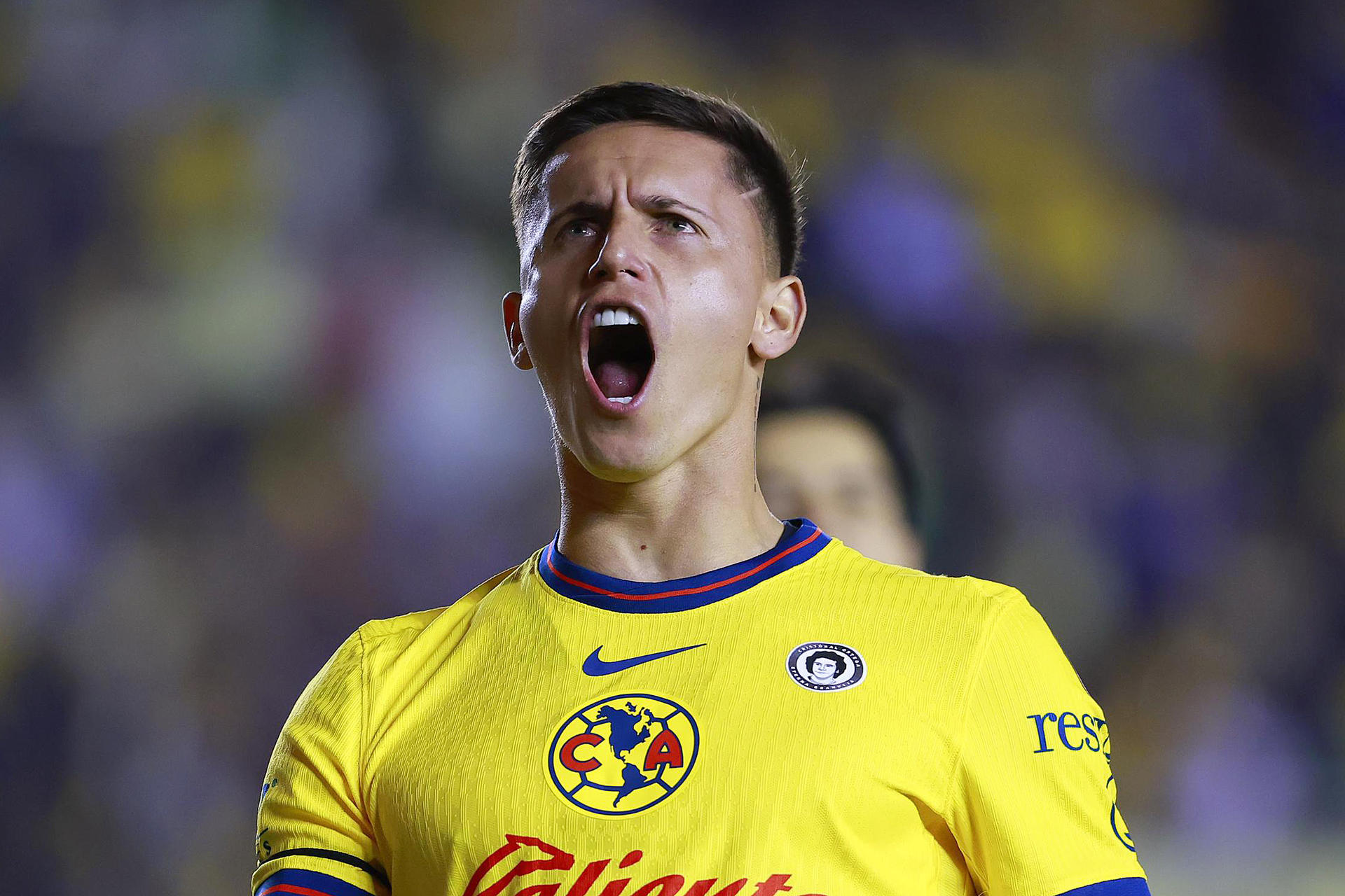Paul Brian Rodríguez de América celebra un gol ante Tigres. EFE/ Sáshenka Gutiérrez