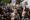 Manifestantes corean consignas contra Liu y exhibien pancartas en rechazo a China durante la rueda de prensa de la 'influencer'. EFE/EPA/RITCHIE B. TONGO
