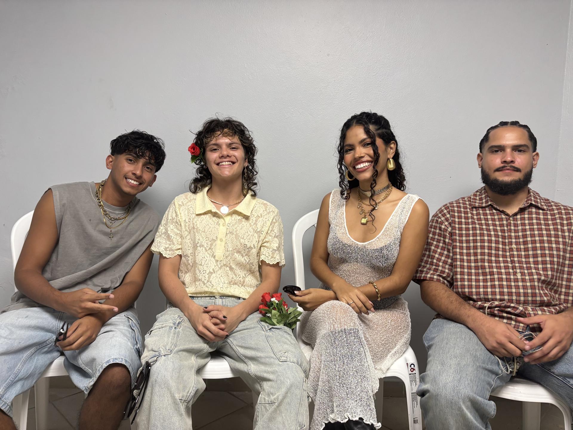 Fotografía del 21 de marzo de 2025 de los hermanos Wester Aldarondo (i), Lorén Aldarondo (2d), y Wilfredo 'Willy' Aldarondo (d), y Adrián López, de la banda Chuwi, posando durante una entrevista con EFE en el Anfiteatro Tito Puente de San Juan (Puerto Rico). EFE/Esther Alaejos
