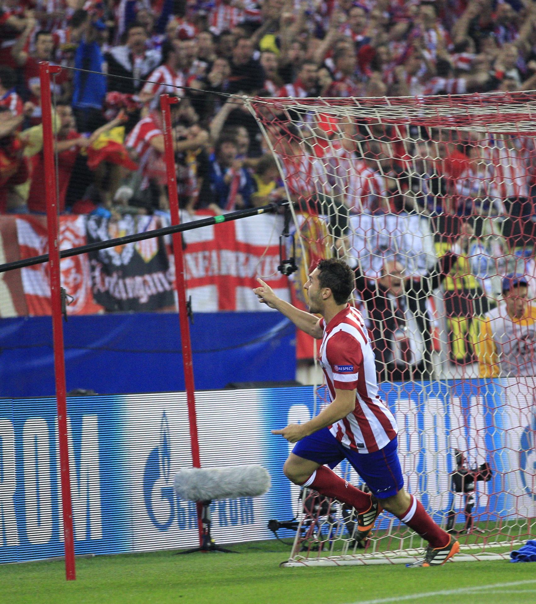 Koke celebra el 1-0 al Barcelona en el partido de vuelta de los cuartos de final de la Liga de Campeones de 2013-14. EFE/Alberto Martín