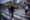 Personas caminan por una avenida durante una manifestación de transportistas este jueves, en Lima (Perú). EFE/ John Reyes Mejia