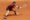 El tenista italiano Matteo Arnaldi devuelve la bola al estadounidense Frances Tiafoe durante el partido de octavos de final individual masculino del Mutua Madrid Open este miércoles en la Caja Mágica en Madrid. EFE/ Chema Moya