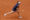 La tenista japonesa Moyuka Uchijima en acción ante la ucraniana Elena Svitolina durante el partido de cuartos de final individual femenino del Mutua Madrid Open, en la Caja Mágica de Madrid. EFE/ Chema Moya
