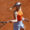 La tenista rusa Mirra Andreeva ante la polaca Magdalena Fręch durante el partido de dieciseisavos de final del Mutua Madrid Open de tenis que se disputa en la Caja Mágica, en Madrid. EFE/Chema Moya