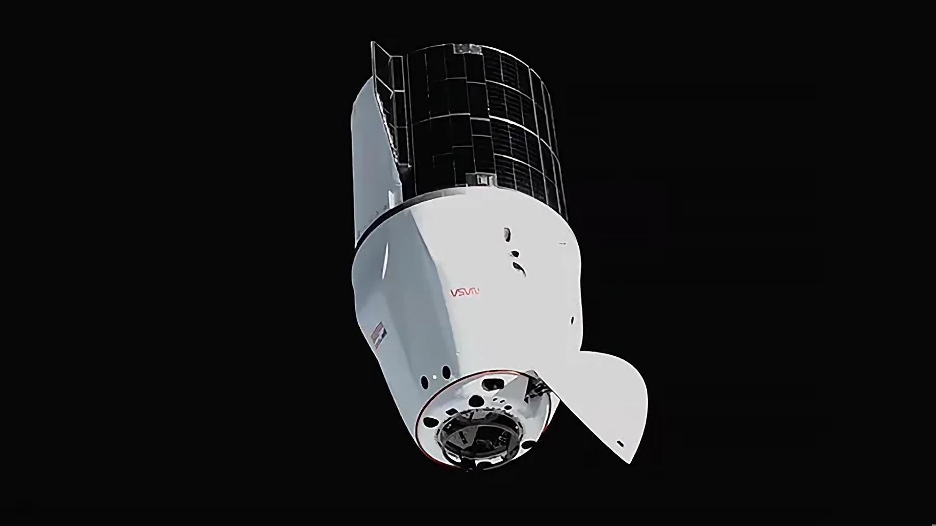 Fotografía cedida por la NASA donde se observa a la cápsula de carga Dragon de SpaceX, con su cono frontal abierto, mientras se aproxima al módulo Harmony de la Estación Espacial Internacional para acoplarse. EFE/NASA