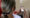 La cubana Heidy Sánchez, quien fue separada de su hija de 17 meses antes de ser deportada desde EE.UU., mira una foto de su niña, durante una entrevista con EFE, en La Habana (Cuba). EFE/Ernesto Mastrascusa
