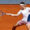 El tenista noruego Casper Ruud golpea la bola contra el ruso Daniil Medvedev, durante su partido de cuartos de final del Mutua Madrid Open de tenis disputado este jueves en la Caja Mágica, en Madrid. EFE/ Chema Moya