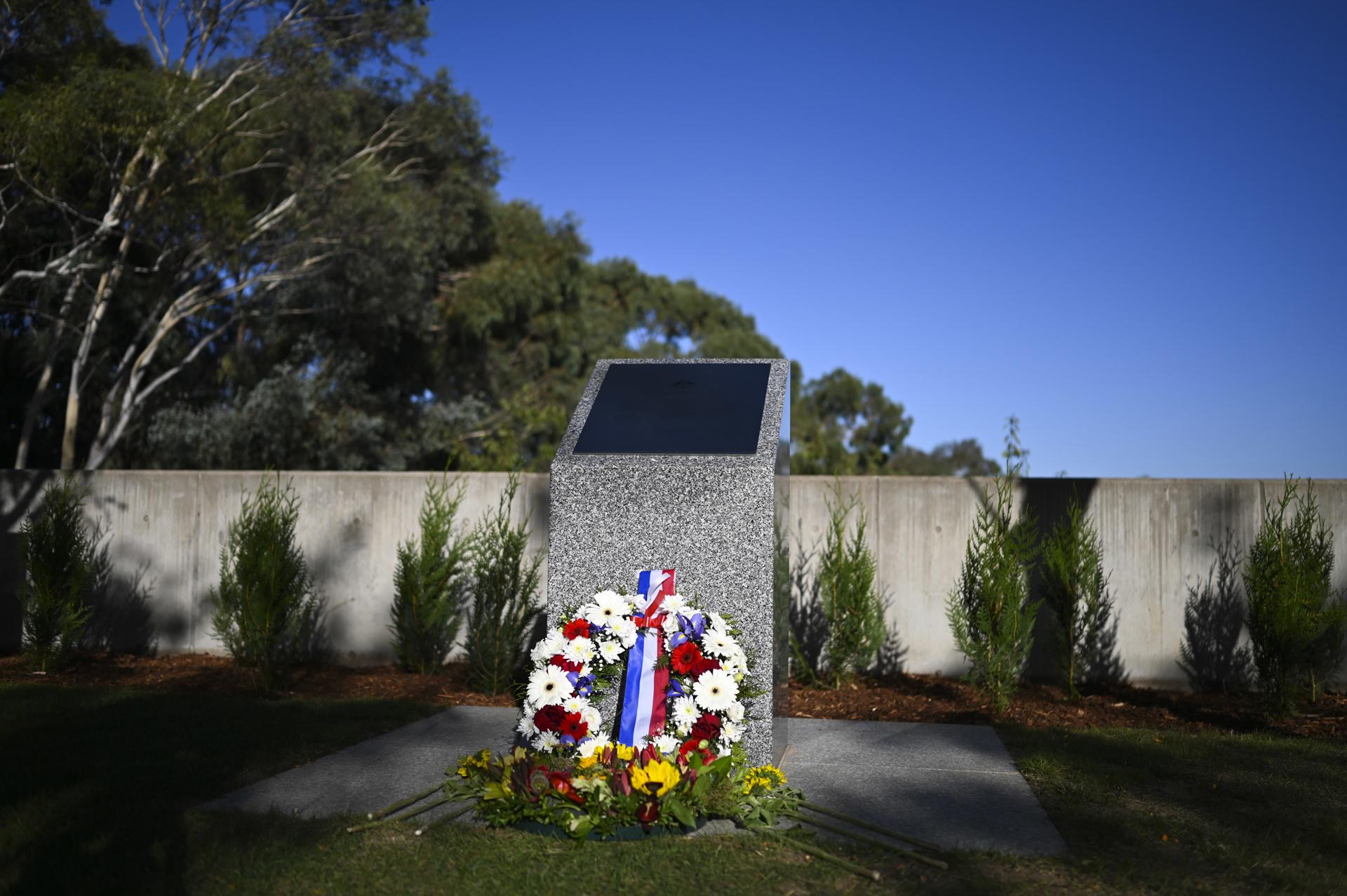 epa07466259 A wreath laid by Dutch Foreign Minister Stef Blok is seen at the MH17 memorial plaque outside Parliament House in Canberra, Australia, 27 March 2019. Blok is visiting Australia to discuss cooperation on counterterrorism efforts, as well as continued aid to the relatives of crash victims lost in the downing of Malaysia Airlines flight MH17. EPA/LUKAS COCH AUSTRALIA AND NEW ZEALAND OUT[AUSTRALIA AND NEW ZEALAND OUT]