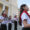 Niños sostienen fotos del papa y cantan canciones este viernes frente a la iglesia Santa María Catedral de Chiclayo (Perú). EFE/Paolo Aguilar
