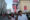Personas toman una fotografía con la imagen del papa León XIV de fondo en la plaza central de Chiclayo (Perú). EFE/Paolo Aguilar