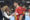 Pilar Alegría, ministra de Educación, felicita a los jugadores de la seleccion española, que celebran su victoria tras el partido de la selección Española de balonmano contra la selección de Letonia, este domingo en Huesca.-EFE/ Javier Blasco
