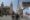 Personas pasan frente a una pancarta con la imagen del papa León XIV en la Plaza de Armas en Chiclayo (Péru). EFE/ Paolo Aguilar
