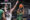 Kaissius Robertson (d) del Joventut ante Zoran Dragic del Bilbao Basket este sábado, durante el partido de Liga Endesa en el pabellón olímpico de Badalona. EFE/ Alejandro García