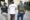 Fotografía cedida por el Departamento de Aplicación de la Ley de Florida (FDLE) de agentes de la policía trasladando a un inmigrante detenido durante la operación 'Marea Negra' este jueves, en Miami (Estados Unidos). EFE/ Departamento de Aplicación de la Ley de Florida /
