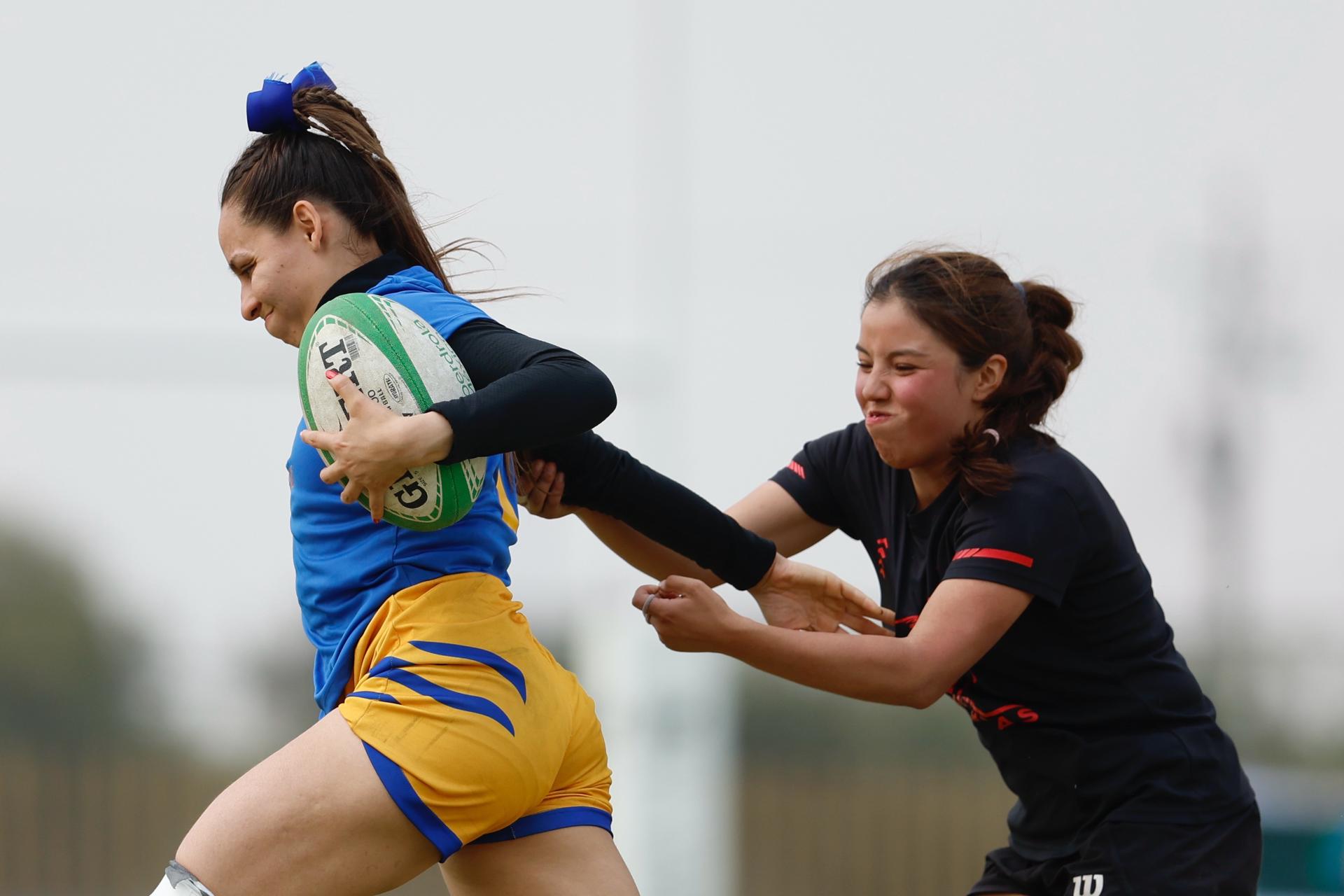 Fotografía de jugadoras de Tigresas y Lanceras participando en el Torneo Interuniversitario de Iberdrola México-DestElla en Ciudad de México (México). EFE/ Sáshenka Gutiérrez