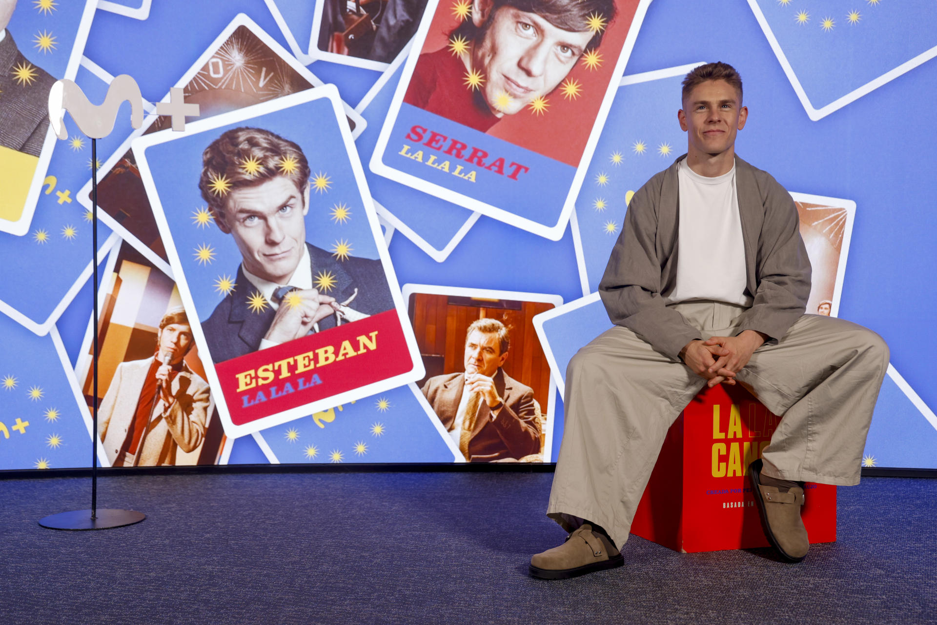 El actor Patrick Criado posa durante la presentación de 'La Canción', de Movistar+, este martes en Madrid. Carolina Yuste se mete en la piel de Massiel, con su 'La, la, la', en una miniserie que se estrena este jueves y que cuenta la victoria de España en el Festival de Eurovisión de 1968, pero va más allá porque 'La canción' -como dice la actriz- sirve para denunciar la represión que existía en el país en esos momentos. Yuste y el actor Patrick Criado han hablado con EFE de esta miniserie, que se estrenará en Movistar + Plus, que se basa en hechos reales que son bien conocidos por buena parte de los españoles, y que transcurren en los cuatro meses antes de ese festival en el que triunfó la garra y la energía de una Massiel, en la que parece haberse enfundado perfectamente la reciente ganadora de un Goya. EFE/ Blanca Míllez