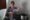 Gaby Ruzasto posa durante una entrevista con EFE en Chiclayo (Perú) y muestra la imagen del papa León XIV sirviéndose concentrado, un plato típico de comida casera peruana. EFE/ Paolo Aguilar

