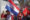 Una persona sostiene una bandera durante la manifestación en conmemoración del Día Internacional de los Trabajadores este 1 de mayo de 2025, en Asunción (Paraguay). EFE/ Juan Pablo Pino
