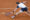 El tenista británico Jack Draper en acción ante el italiano Matteo Arnaldi durante el partido de cuartos de final del Mutua Madrid Open que disputan este jueves en las instalaciones de la Caja Mágica en Madrid. EFE/ Chema Moya
