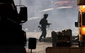 BALATA (-), 18/06/2025.- An Israeli soldier checks the area after demolishing a store with explosives during a military operation in the Balata refugee camp, near the West Bank city of Nablus, 18 June 2025. According to the Palestinian Health Ministry, at least 20 Palestinians were wounded during the operation. EFE/EPA/ALAA BADARNEH