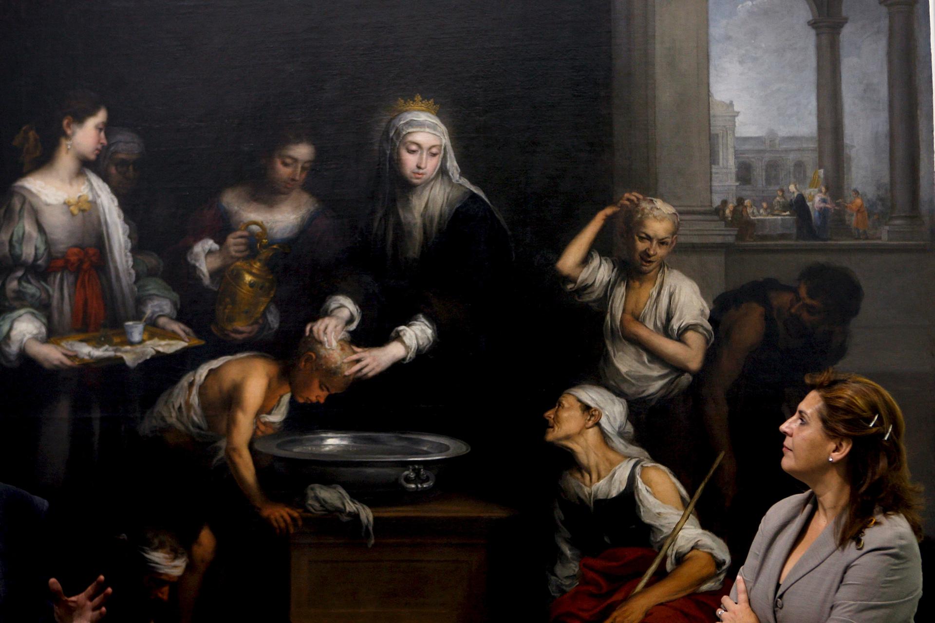 La obra de Bartolomé Esteban Murillo "Santa Isabel de Hungría curando a los tiñosos", lienzo procedente de la Iglesia de San Jorge del Hospital de la Santa Caridad de Sevilla. EFE/Eduardo Abad
