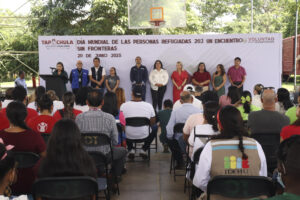 Autoridades locales y organizaciones sociales participan en un acto protocolario por el día mundial del refugiado este viernes, en Tapachula (México). EFE/ Juan Manuel Blanco
