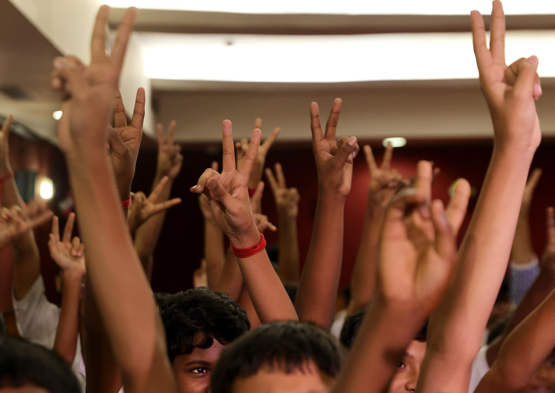 Indian students and families react as they watch a live telecast of the Dragon spacecraft landing on Earth, at the Birla Industrial and Technological Museum (BITM) in Kolkata, India 15 July 2025. Piloted by Indian astronaut Shubhanshu Shukla the Dragon spacecraft returned to Earth after completing the Axiom 4 mission. EFE/EPA/PIYAL ADHIKARY