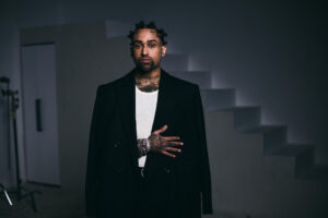 Fotografía sin fecha cedida por Squid del rapero puertorriqueño Bryant Myers. Myers, considerado el pionero del trap latino, presenta "toda la musa que tenía guardada" con el lanzamiento este jueves del álbum 'Millo Gangster Club' de 14 temas, la primera parte de un proyecto que estará compuesto de tres discos. EFE/ Squid