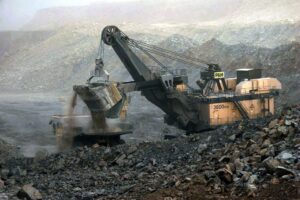 ARCHIVE - epa03086902 (FILE) A file photo dated 07 July 2005 showing an earth digger dumping dirt on to a large truck at the Antaibao open-air coal mine near Shuozhou, Shanxi Province, China. Geneva-based World Trade Organization (WTO) dismissed a Chinese appeal on 30 January 2012 and upheld its decision that Beijingís practice of limiting certain raw materials including magnesium should end. Western countries that won the trade dispute over Chinese export restrictions on industrial raw materials, have already set their sights on a new goal: prying open Beijing's restrictive policies on rare earths. However, China is unlikely to budge on these minerals, now sought after by high-tech industries, unless there is a specific new ruling by the World Trade Organization (WTO), expert Jaakko Kooroshy said 31 January 2012. EPA/QILAI SHEN