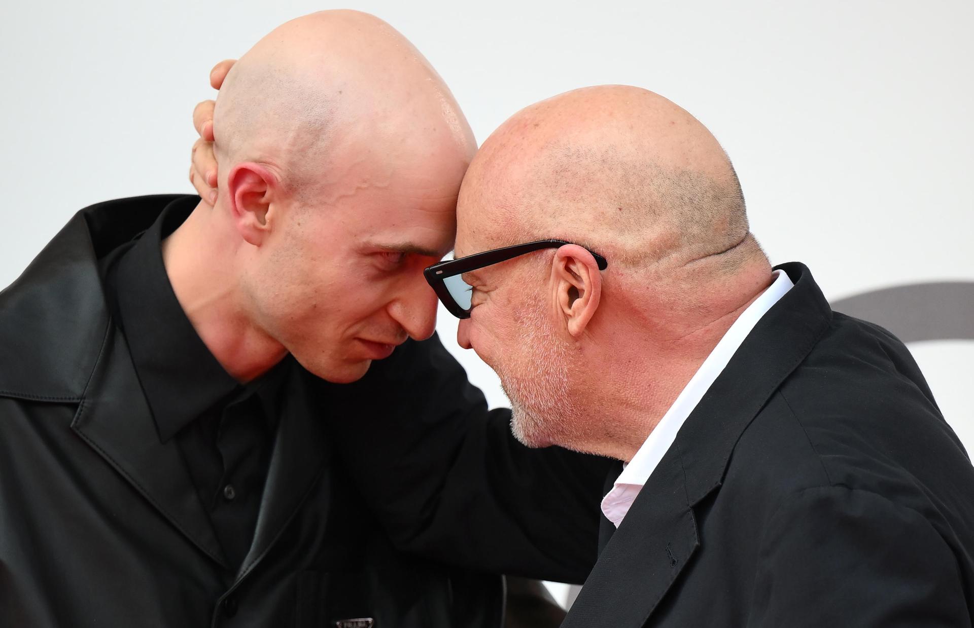 VENICE (Italy), 30/08/2025.- Italian director Gianfranco Rosi (R) and British composer Daniel Blumberg arrive for the screening of 'Sotto le Nuvole' during the 82nd annual Venice International Film Festival, in Venice, Italy, 30 August 2025. The film festival runs from 27 August to 06 September 2025. (Cine, Cine, Italia, Venecia) EFE/EPA/ETTORE FERRARI