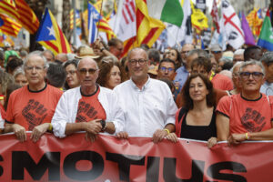 President of the Catalan National Assembly (ANC) Lluis Llach (2-L) and President of Omnium Cultural Xavier Antich (C) demonstrate during the Catalonian National Day (Diada) in Barcelona, Spain on 11 September 2025. The Catalonian national day is the anniversary of the fall of Barcelona during the Succession War in 1714. EFE/Quique Garcia